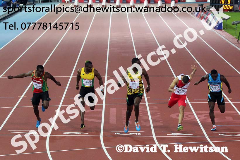 Kemar Bailey-Cole (Jamaica) wins from Adam Gemili (England) in the 100 metres at the Commonwealth Games, Glasgow. Photo: David T. Hewitson/Sports for All Pics
